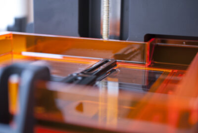 3D printer for SLA (stereolithography) printing using photopolymer resin.